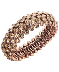 Craving chocolate? Add rich brown tones to your look in Charter Club's chic design. Bracelet set in brown gold tone mixed metal with sparkling brown glass accents. Bracelet stretches to fit the wrist. Approximate diameter: 2-1/4 inches. Craving chocolate? Add rich brown tones to your look in Charter Club's chic design. Bracelet set in brown gold tone mixed metal with sparkling brown glass accents. Bracelet stretches to fit the wrist. Approximate diameter: 2-1/4 inches.