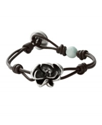 Equal parts romantic and rugged, by Fossil. Knotted chocolate leather cord holds one faceted amazonite bead and a sculpted posey crafted from vintage silver tone mixed metal with crystals at the center. Approximate length: 7-1/2 inches. Equal parts romantic and rugged, by Fossil. Knotted chocolate leather cord holds one faceted amazonite bead and a sculpted posey crafted from vintage silver tone mixed metal with crystals at the center. Approximate length: 7-1/2 inches.