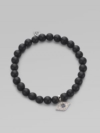 A protective symbol in many cultures, an evil eye charm of 14k white gold is richly set with diamonds and sapphires, and hangs from a stretchy strand of matte black onyx beads. Diamonds, 0.07 tcw Black onyx 14k white gold Diameter, about 2 (unstretched) Charm length, about ½ Imported A protective symbol in many cultures, an evil eye charm of 14k white gold is richly set with diamonds and sapphires, and hangs from a stretchy strand of matte black onyx beads. Diamonds, 0.07 tcw Black onyx 14k white gold Diameter, about 2 (unstretched) Charm length, about ½ Imported