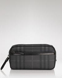 A smart and timeless travel accessory, the Burberry Coalburn Washbag offers a luxe dopp kit that makes jet-setting in style a task that's never been easier. A smart and timeless travel accessory, the Burberry Coalburn Washbag offers a luxe dopp kit that makes jet-setting in style a task that's never been easier.