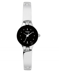 A starkly elegant watch from Caravelle by Bulova with a bold blend of black and silver. Silvertone mixed metal bangle bracelet and round case. Round black dial with logo and stick indices. Quartz movement. Two-year limited warranty. A starkly elegant watch from Caravelle by Bulova with a bold blend of black and silver. Silvertone mixed metal bangle bracelet and round case. Round black dial with logo and stick indices. Quartz movement. Two-year limited warranty.
