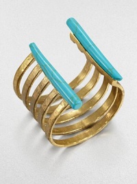 From the Horn Collection. Simply striking, this open cuff of golden bands with an antiqued finish is edged with baguette-shaped natural stones with the veiny look of turquoise.Natural stone18k goldplatedDiameter, about 2.25Width, about 2.75Made in USA From the Horn Collection. Simply striking, this open cuff of golden bands with an antiqued finish is edged with baguette-shaped natural stones with the veiny look of turquoise.Natural stone18k goldplatedDiameter, about 2.25Width, about 2.75Made in USA