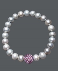 A traditional design receives a sparkling touch. Cultured freshwater pearls (8-9 mm) in shimmery grey hues adorn this chic stretch bracelet, while a purple crystal fireball adds extra glamour. Approximate diameter: 3-1/2 inches. A traditional design receives a sparkling touch. Cultured freshwater pearls (8-9 mm) in shimmery grey hues adorn this chic stretch bracelet, while a purple crystal fireball adds extra glamour. Approximate diameter: 3-1/2 inches.