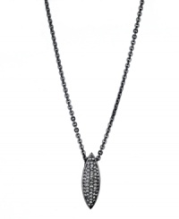 A chic canoe-shaped pendant adds a distinctive design detail to T Tahari's necklace. Accented by glittering black diamond-hued crystals, it's set in hematite tone mixed metal. Approximate length: 18 inches + 3-inch extender. Approximate drop: 1/4 inch. A chic canoe-shaped pendant adds a distinctive design detail to T Tahari's necklace. Accented by glittering black diamond-hued crystals, it's set in hematite tone mixed metal. Approximate length: 18 inches + 3-inch extender. Approximate drop: 1/4 inch.