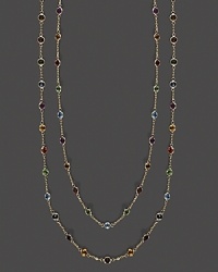 A brilliant medley of faceted semi-precious stones set in a long, luxe 14K yellow gold necklace A brilliant medley of faceted semi-precious stones set in a long, luxe 14K yellow gold necklace