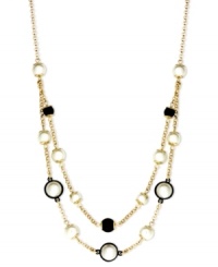 Be bold with some help from Anne Klein. This beaded necklace highlights plastic jet and pearl accents. Crafted in gold tone mixed metal. Approximate length: 16 inches + 2-inch extender. Be bold with some help from Anne Klein. This beaded necklace highlights plastic jet and pearl accents. Crafted in gold tone mixed metal. Approximate length: 16 inches + 2-inch extender.