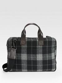 Mixing style with utility, this double-faced wool brief is water resistant and extremely durable.Zip closureDouble top handlesAdjustable, removable shoulder strapInterior zip pocketInterior laptop pocketWool12W x 16H x 2DImported Mixing style with utility, this double-faced wool brief is water resistant and extremely durable.Zip closureDouble top handlesAdjustable, removable shoulder strapInterior zip pocketInterior laptop pocketWool12W x 16H x 2DImported