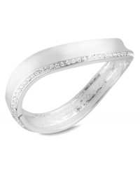 Make waves with this hinged bangle bracelet from Robert Lee Morris. Crafted from silver-tone mixed metal, the piece gets a lustrous addition by way of glass pave crystal accents. Approximate diameter: 2-3/8 inches. Make waves with this hinged bangle bracelet from Robert Lee Morris. Crafted from silver-tone mixed metal, the piece gets a lustrous addition by way of glass pave crystal accents. Approximate diameter: 2-3/8 inches.