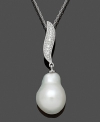 Like a shimmering piece of artwork, Belle de Mer's Baroque-style pendant will captivate. Crafted in 14k white gold, pendant highlights a cultured freshwater pearl (11-12 mm) and a stylish, swirling bail dusted with diamond accents. Approximate length: 18 inches. Approximate drop: 1-1/4 inches. Like a shimmering piece of artwork, Belle de Mer's Baroque-style pendant will captivate. Crafted in 14k white gold, pendant highlights a cultured freshwater pearl (11-12 mm) and a stylish, swirling bail dusted with diamond accents. Approximate length: 18 inches. Approximate drop: 1-1/4 inches.