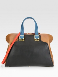 An impeccably tailored silhouette of supple colorblock leather, finished with dual straps for versatility.Double top handles, 5½ dropDetachable adjustable shoulder strap, 18-24½ dropTop zip closureProtective metal feetOne inside zip pocketTwo inside open pocketsCotton lining15W X 11H X 6½DMade in Italy An impeccably tailored silhouette of supple colorblock leather, finished with dual straps for versatility.Double top handles, 5½ dropDetachable adjustable shoulder strap, 18-24½ dropTop zip closureProtective metal feetOne inside zip pocketTwo inside open pocketsCotton lining15W X 11H X 6½DMade in Italy