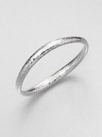 From the Glamazon Collection. Sleek sterling silver style with beautiful hammered texture and a wavy shape. Sterling silverDiameter, about 2.5Slip-on styleImported From the Glamazon Collection. Sleek sterling silver style with beautiful hammered texture and a wavy shape. Sterling silverDiameter, about 2.5Slip-on styleImported