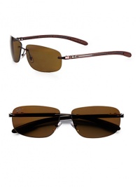 Rimless style with an engraved logo accent on the temples and left lens. Available in polarized brown frames with brown lenses.Metal/carbon fiber100% UV ProtectionMade in Italy Rimless style with an engraved logo accent on the temples and left lens. Available in polarized brown frames with brown lenses.Metal/carbon fiber100% UV ProtectionMade in Italy