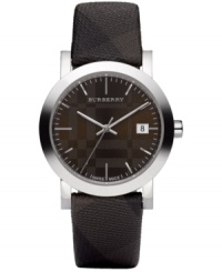 Mysterious intrigue envelops the iconic check patterns of this Burberry timepiece. Mysterious intrigue envelops the iconic check patterns of this Burberry timepiece.