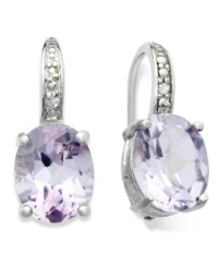 The perfect pop of purple. Victoria Townsend's stunning sterling silver earrings feature X-cut amethyst (4-3/4 ct. t.w.) and glittering diamond accents. Approximate drop: 3/4 inch. Approximate diameter: 3/8 inch. The perfect pop of purple. Victoria Townsend's stunning sterling silver earrings feature X-cut amethyst (4-3/4 ct. t.w.) and glittering diamond accents. Approximate drop: 3/4 inch. Approximate diameter: 3/8 inch.