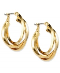 Circle back around this season with these exquisite earrings from Anne Klein. Featuring three hoop rings in an intricate design. Crafted in gold tone mixed metal. Approximate diameter: 3/4 inch. Circle back around this season with these exquisite earrings from Anne Klein. Featuring three hoop rings in an intricate design. Crafted in gold tone mixed metal. Approximate diameter: 3/4 inch.