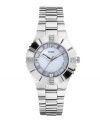 A mother-of-pearl dial and crystal accents punch up a classic timepiece by GUESS.