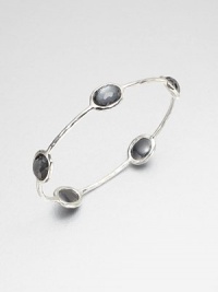 From the Rock Candy® Collection. Five faceted hematite doublet stations set on a hammered sterling silver bangle. Hematite doubletSterling silverDiameter, about 2.5Slip-on styleImported From the Rock Candy® Collection. Five faceted hematite doublet stations set on a hammered sterling silver bangle. Hematite doubletSterling silverDiameter, about 2.5Slip-on styleImported