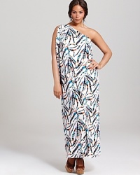 A shape-shifting T Bags maxi dress gets a bold boost with a graphic tropical print. Play up the asymmetric cut with chandelier earrings. A shape-shifting T Bags maxi dress gets a bold boost with a graphic tropical print. Play up the asymmetric cut with chandelier earrings.