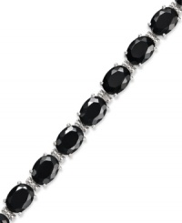Stand out. Oval-cut onyx gemstones (18-3/4 ct. t.w.) and sparkling diamond accents adorn this chic bracelet. Crafted in sterling silver. Approximate length: 7-1/2 inches. Stand out. Oval-cut onyx gemstones (18-3/4 ct. t.w.) and sparkling diamond accents adorn this chic bracelet. Crafted in sterling silver. Approximate length: 7-1/2 inches.