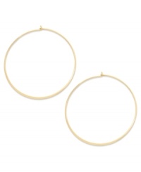 A classic touch. Studio Silver's endless hoop earrings, set in 18k gold over sterling silver, offer a timeless look that's quite elegant. Approximate diameter: 2-1/4 inches.