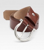 This distinguished style is rendered in luxe saddle leather with an adjustable design and shiny palladio gancini buckle.CalfskinPalladio buckleAbout 1½ wideMade in Italy