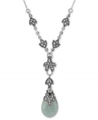 Earthy elegance. Genevieve & Grace's Y-shaped necklace is crafted from sterling silver, with a flower motif, as well as marcasite and jade (16-1/2 ct. t.w.) adding to the appeal. Approximate length: 16 inches. Approximate drop: 1 inch. Approximate width: 1/2 inch. Earthy elegance. Genevieve & Grace's Y-shaped necklace is crafted from sterling silver, with a flower motif, as well as marcasite and jade (16-1/2 ct. t.w.) adding to the appeal. Approximate length: 16 inches. Approximate drop: 1 inch. Approximate width: 1/2 inch.