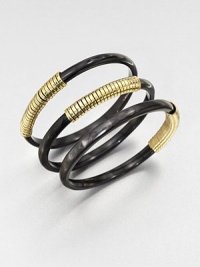 A set of three horn bangles wrapped in shiny brass wire. Recycled ankole cow hornRecycled brassDiameter, about 2.5Slip-on styleImported 