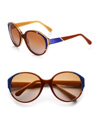 Oversized acetate frames with elegant, colorblocked detail and shiny metal trim accent these celeb-worthy shades. Available in brown/honey/blue and light gold metal with brown lens or smoke/cream and light gold metal with grey lens.Plastic temples100% UV protectionMade in Italy Oversized acetate frames with elegant, colorblocked detail and shiny metal trim accent these celeb-worthy shades. Available in brown/honey/blue and light gold metal with brown lens or smoke/cream and light gold metal with grey lens.Plastic temples100% UV protectionMade in Italy