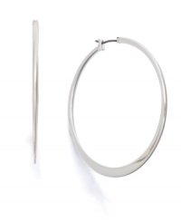 Cutting-edge style by Lauren by Ralph Lauren. Knife-edge hoop earrings in silvertone mixed metal. Approximate diameter: 2 inches. Cutting-edge style by Lauren by Ralph Lauren. Knife-edge hoop earrings in silvertone mixed metal. Approximate diameter: 2 inches.