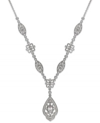 Look pretty in vintage-chic with Eliot Danori's Ella Y necklace. Intricate patterns shine with sparkling crystals and cubic zirconias (3/4 ct. t.w.). Crafted in rhodium-plated silver tone mixed metal. Approximate length: 16 inches + 2-inch extender. Approximate drop: 4-1/2 inches.