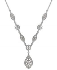Look pretty in vintage-chic with Eliot Danori's Ella Y necklace. Intricate patterns shine with sparkling crystals and cubic zirconias (3/4 ct. t.w.). Crafted in rhodium-plated silver tone mixed metal. Approximate length: 16 inches + 2-inch extender. Approximate drop: 4-1/2 inches. Look pretty in vintage-chic with Eliot Danori's Ella Y necklace. Intricate patterns shine with sparkling crystals and cubic zirconias (3/4 ct. t.w.). Crafted in rhodium-plated silver tone mixed metal. Approximate length: 16 inches + 2-inch extender. Approximate drop: 4-1/2 inches.
