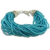 Italian Styled Blue Glass Seed 30 Strand Bracelet with Balinese Toggle Clasp Italian Styled Blue Glass Seed 30 Strand Bracelet with Balinese Toggle Clasp