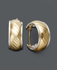 A look to transcend time. Hoops are an effortless addition to your collection. Crafted in 14k gold and sterling silver, surface features a chic, diamond-cut pattern. Approximate diameter: 3/4 inch. A look to transcend time. Hoops are an effortless addition to your collection. Crafted in 14k gold and sterling silver, surface features a chic, diamond-cut pattern. Approximate diameter: 3/4 inch.
