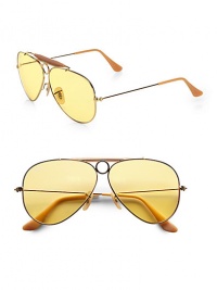 A vivid update to the classic aviator style, crafted in sleek, sophisticated metal and acetate with prominent top bar. Available in gold with ambermatic lens.Metal temples100% UV protectionMade in Italy A vivid update to the classic aviator style, crafted in sleek, sophisticated metal and acetate with prominent top bar. Available in gold with ambermatic lens.Metal temples100% UV protectionMade in Italy