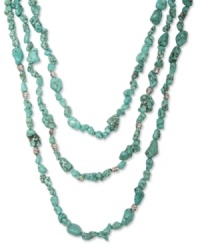 Get stranded in style. Lucky Brand's layered necklace features three rows of semi-precious turquoise stones embellished with silvery knot accents. Set in silver tone mixed metal. Approximate length: 25 inches. Get stranded in style. Lucky Brand's layered necklace features three rows of semi-precious turquoise stones embellished with silvery knot accents. Set in silver tone mixed metal. Approximate length: 25 inches.