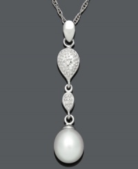 Linear elegance. This shapely pendant incorporates a cultured freshwater pearl drop (7-8 mm) and two diamond-accented drops. Set in sterling silver. Approximate length: 18 inches. Approximate drop: 3/4 inch. Linear elegance. This shapely pendant incorporates a cultured freshwater pearl drop (7-8 mm) and two diamond-accented drops. Set in sterling silver. Approximate length: 18 inches. Approximate drop: 3/4 inch.