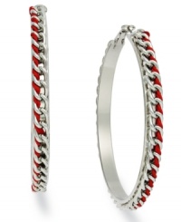 Flaunt the bold, exotic colors of Brasil. Red ribbon serves as the focal point of these Falchi braided hoops in silver tone mixed metal. Approximate diameter: 2-1/2 inches. Flaunt the bold, exotic colors of Brasil. Red ribbon serves as the focal point of these Falchi braided hoops in silver tone mixed metal. Approximate diameter: 2-1/2 inches.