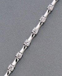Utterly unique. Links of cylindrical platinum over sterling silver separate gleaming round-cut cubic zirconia (2-1/10 ct. t.w.) in this stunning CRISLU bracelet. Approximate length: 7-1/2 inches. Utterly unique. Links of cylindrical platinum over sterling silver separate gleaming round-cut cubic zirconia (2-1/10 ct. t.w.) in this stunning CRISLU bracelet. Approximate length: 7-1/2 inches.