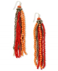 Infuse your look with tassels inspired by the tropics. INC International Concepts' shoulder-dusting style features a red-hot seed bead design in coral-to-red hues. Set in mixed metal. Approximate drop: 4-1/4 inches. Infuse your look with tassels inspired by the tropics. INC International Concepts' shoulder-dusting style features a red-hot seed bead design in coral-to-red hues. Set in mixed metal. Approximate drop: 4-1/4 inches.