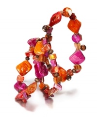 Fiery hot hues add just the right touch. Style&co.'s three bracelet set combines bright orange shells and wooden beads in a slip-on stretch setting. Crafted in oxidized brass tone mixed metal. Approximate length: 7 inches. Fiery hot hues add just the right touch. Style&co.'s three bracelet set combines bright orange shells and wooden beads in a slip-on stretch setting. Crafted in oxidized brass tone mixed metal. Approximate length: 7 inches.