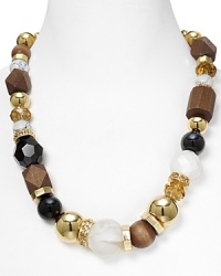 Bold wood and crystal baubles adorn this standout statement piece from kate spade new york, the perfect necklace for adding a bold touch of texture to your favorite spring looks. Bold wood and crystal baubles adorn this standout statement piece from kate spade new york, the perfect necklace for adding a bold touch of texture to your favorite spring looks.