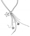 Star light, star bright. GUESS's chic 2-row tassel necklace shines brighter than the rest with a multitude of star charms and sparkling crystal accents. Set in silver tone mixed metal. Approximate length: 18 inches + 2-inch extender. Approximate drop: 4 inches.