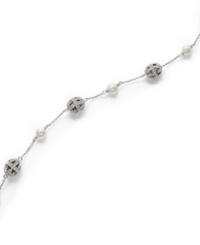 Luxury that lasts. This timeless Eliot Danori bracelet flaunts an exquisite mix of filigree crystal balls and simulated pearls (6 mm). Set in rhodium-plated mixed metal. Approximate length: 7-1/4 inches. Luxury that lasts. This timeless Eliot Danori bracelet flaunts an exquisite mix of filigree crystal balls and simulated pearls (6 mm). Set in rhodium-plated mixed metal. Approximate length: 7-1/4 inches.