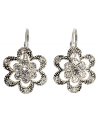 Crystal flower earrings that add light and life to your look. In silvertone mixed metal, by Betsey Johnson. Crystal flower earrings that add light and life to your look. In silvertone mixed metal, by Betsey Johnson.