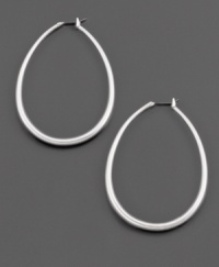 Big style with widespread appeal. These Fossil hoop earrings are crafted in silvertone mixed metal. Approximate drop: 2-1/4 inches. Approximate diameter: 1-1/2 inches. Big style with widespread appeal. These Fossil hoop earrings are crafted in silvertone mixed metal. Approximate drop: 2-1/4 inches. Approximate diameter: 1-1/2 inches.