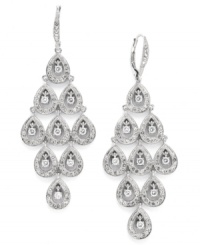 Elegance redefined. Beautifully-crafted chandelier earrings by Eliot Danori add a hint of glamour to your look. Crafted in silver tone mixed metal with a sparkling mix of clear crystals and cubic zirconias (1 ct. t.w.). Approximate drop: 2 inches. Elegance redefined. Beautifully-crafted chandelier earrings by Eliot Danori add a hint of glamour to your look. Crafted in silver tone mixed metal with a sparkling mix of clear crystals and cubic zirconias (1 ct. t.w.). Approximate drop: 2 inches.