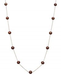 Sumptuous style. Rich chocolate cultured freshwater pearls  6-7 mm) adorn a delicate 14k gold chain on this pretty illusion necklace. Approximate length: 17 inches.