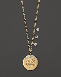 An embossed tree and three glittering diamonds grow on a matte gold disc. An embossed tree and three glittering diamonds grow on a matte gold disc.