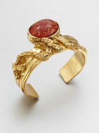 Held in an intriguing freeform setting, a stone of colorfully dotted glass is suspended above your wrist. GlassTextured goldtone brassSmall diameter, about 2.16Medium diameter, about 2.28Large diameter, about 2.48Slip-on styleMade in Italy Held in an intriguing freeform setting, a stone of colorfully dotted glass is suspended above your wrist. GlassTextured goldtone brassSmall diameter, about 2.16Medium diameter, about 2.28Large diameter, about 2.48Slip-on styleMade in Italy