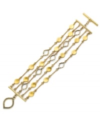 Show your charming personality. Lauren by Ralph Lauren's intricate five-row bracelet features cut-out cloud and teardrop charms. Set in gold tone mixed metal. Approximate length: 7-3/4 inches. Approximate width: 1-1/4 inches. Show your charming personality. Lauren by Ralph Lauren's intricate five-row bracelet features cut-out cloud and teardrop charms. Set in gold tone mixed metal. Approximate length: 7-3/4 inches. Approximate width: 1-1/4 inches.